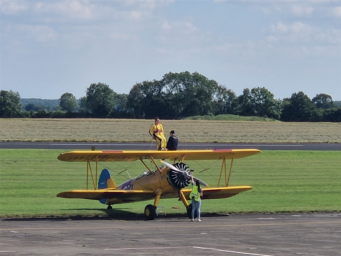 A photo of Shana, perched atop the plane, ready for departure..