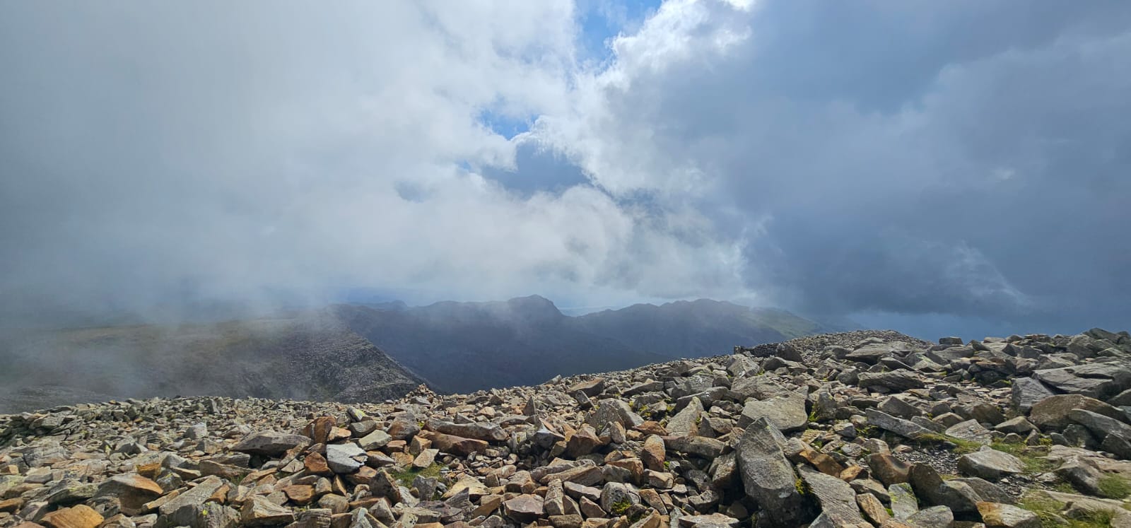 The image captured showcases an exquisite landscape, taken during the ascent of Scafell