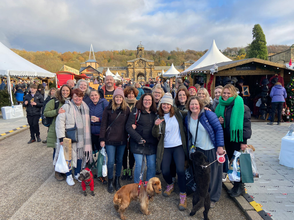 the hr team stood together at the Christmas markets