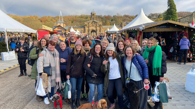 the hr team stood together at the Christmas markets